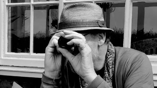 Man with looking glass